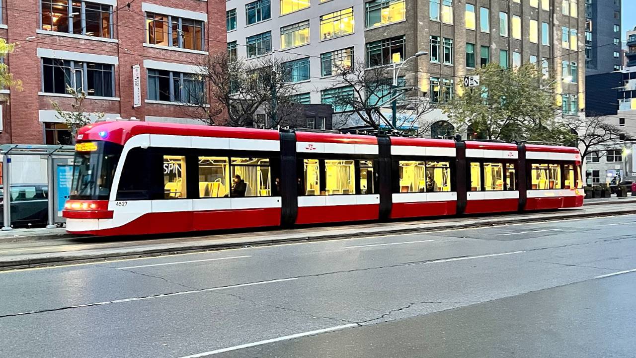 A 510 Spadina streetcar viewed from the side in 2021