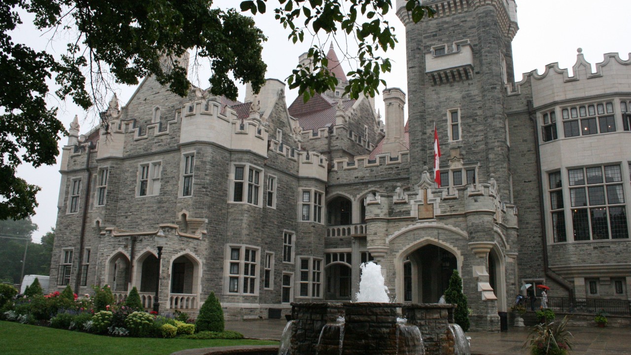 A view of Casa Loma in Toronto, with flowing fountain in the foreground