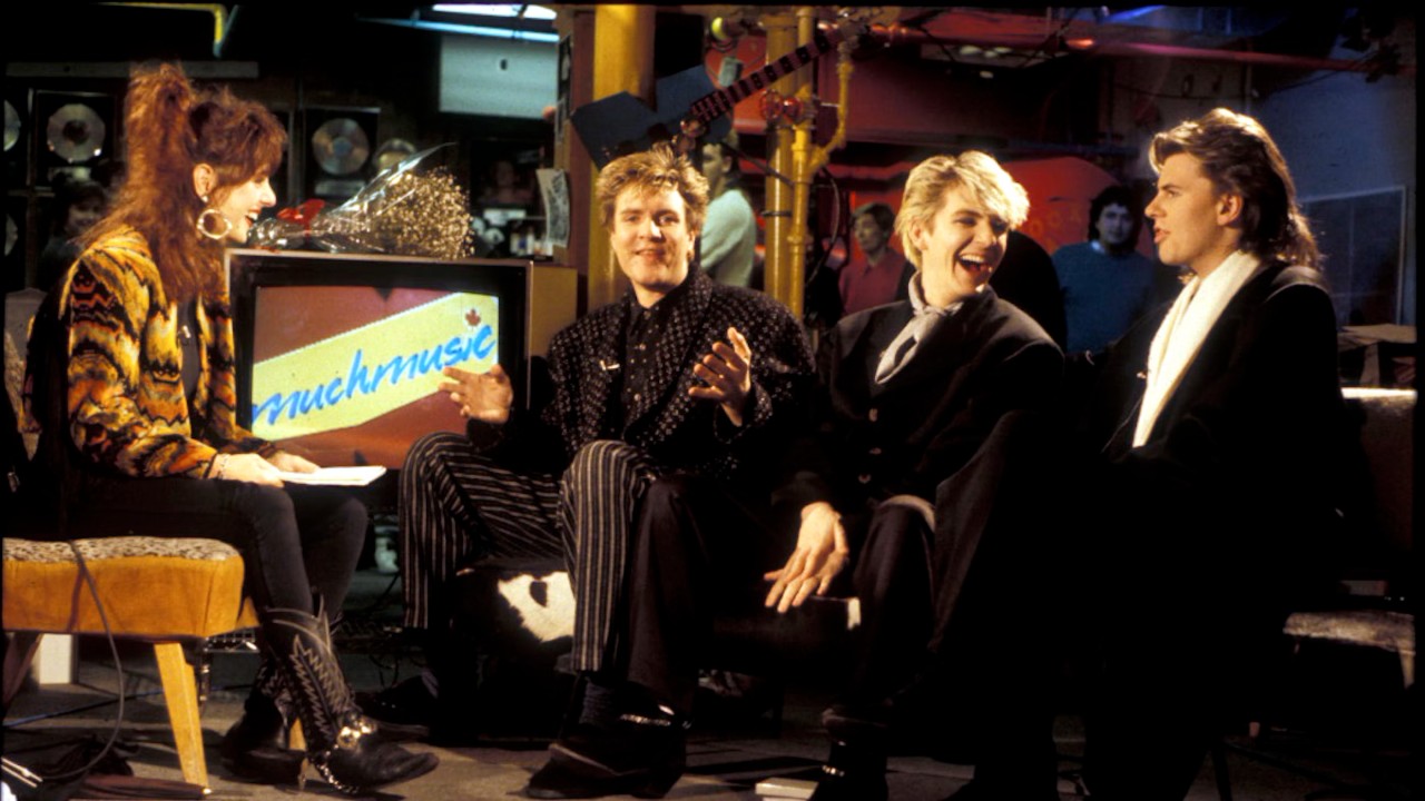 An image of VJ Erica Ehm interviewing Duran Duran at the MuchMusic headquarters