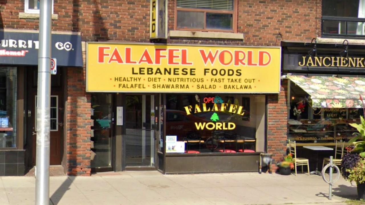 A view of the facade of Falafel World restaurant in Toronto