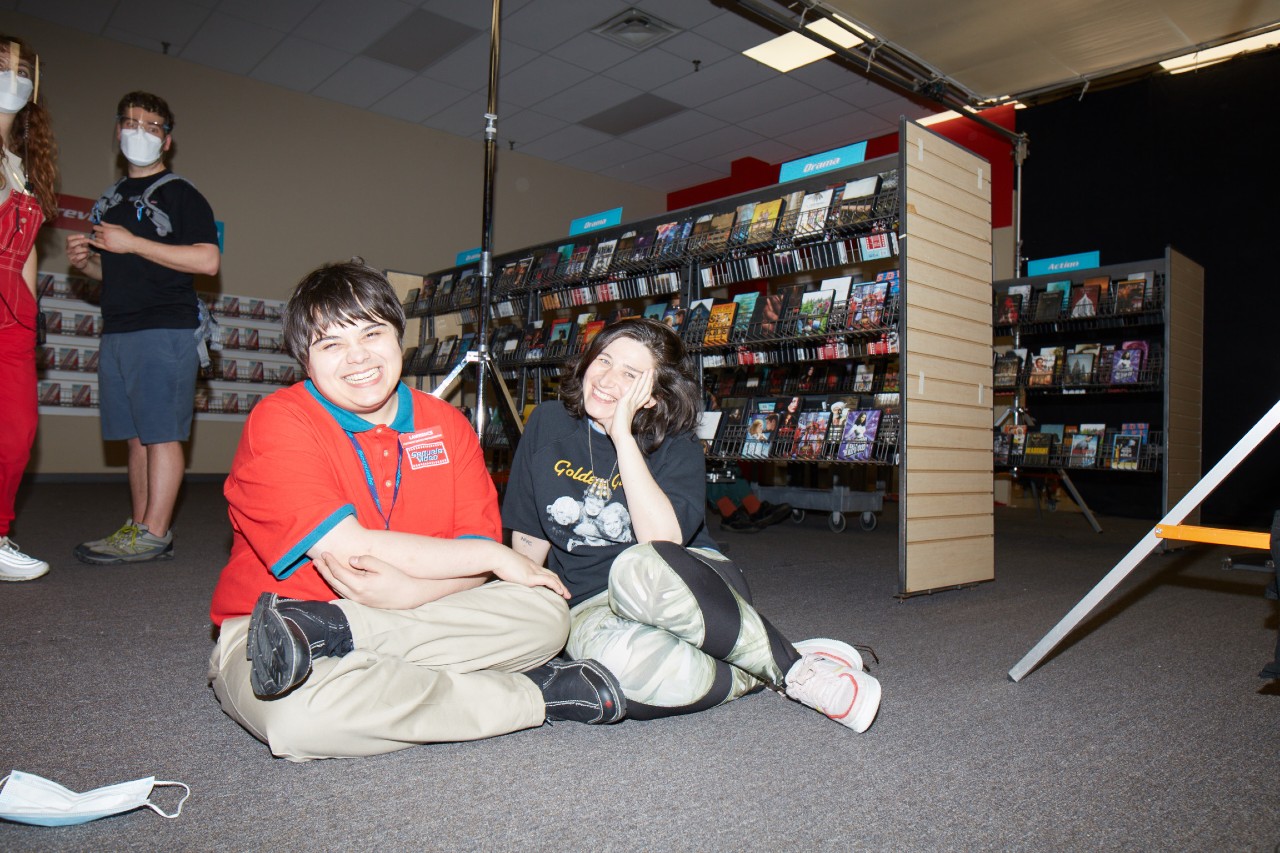 A photo of actor Isaiah Lehtinen and director Chandler Levack on the set of I Like Movies