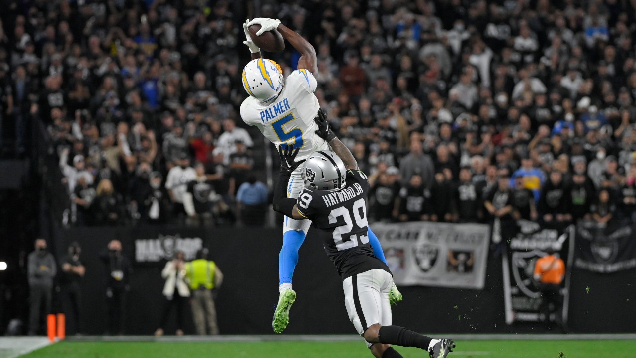 Los Angeles Chargers wide receiver Josh Palmer jumps to catch a pass in a 2022 season NFL football game