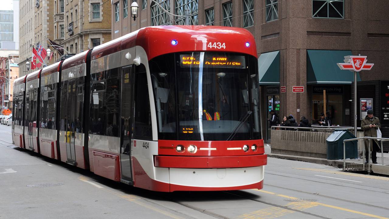 A 504 King streetcar travels in downtown Toronto