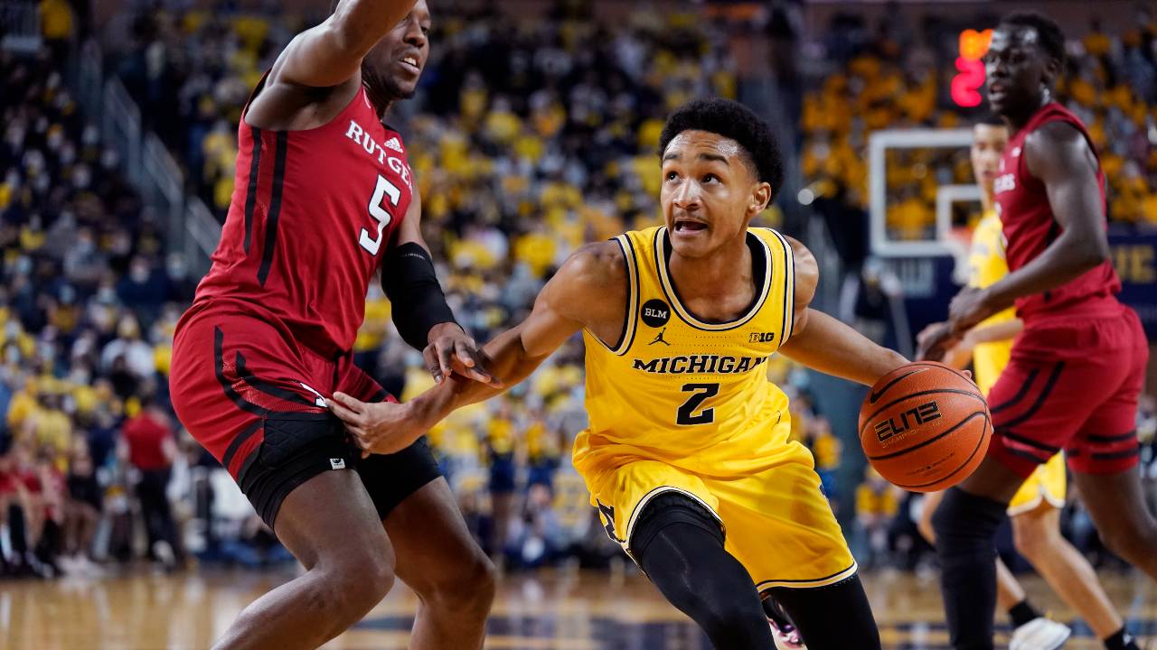 Michigan guard Kobe Bufkin drives to the hoop during a 2023 NCAA college basketball game