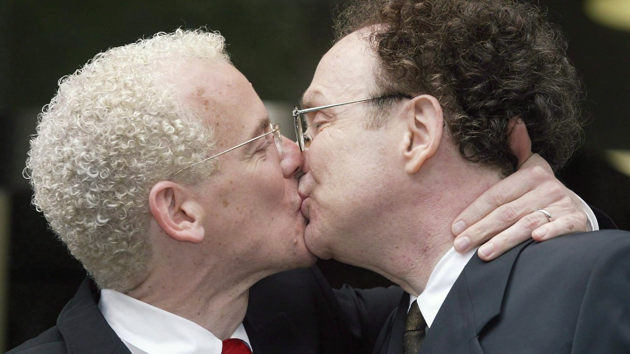 Michael Stark and Michael Leshner kiss after their marriage in Superior Court in Toronto on Tuesday, June 10, 2003