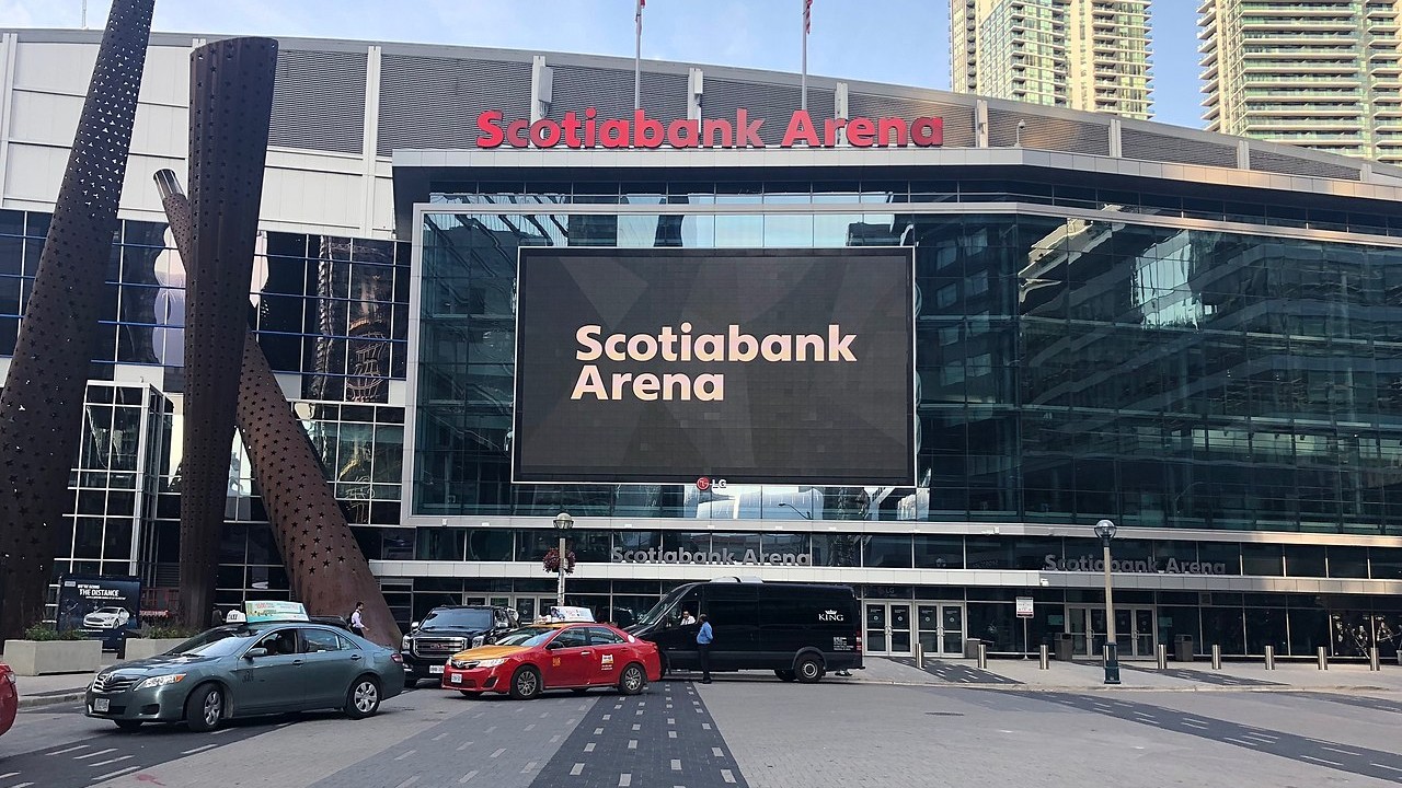 The facade of Scotiabank Arena in 2018 with three cars out front