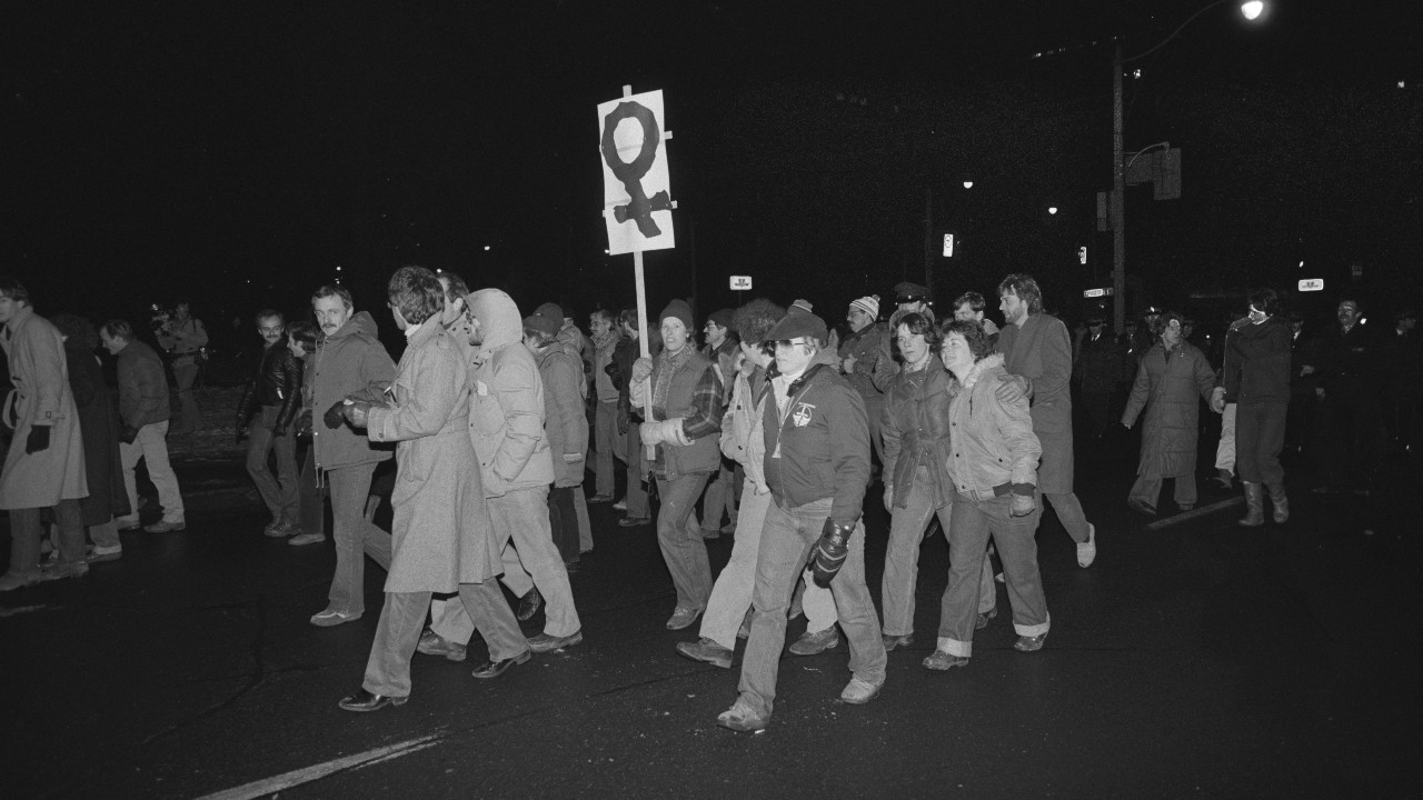 LGBTQ+ rights demonstrators march in protest of the 1981 Toronto bathhouse raids