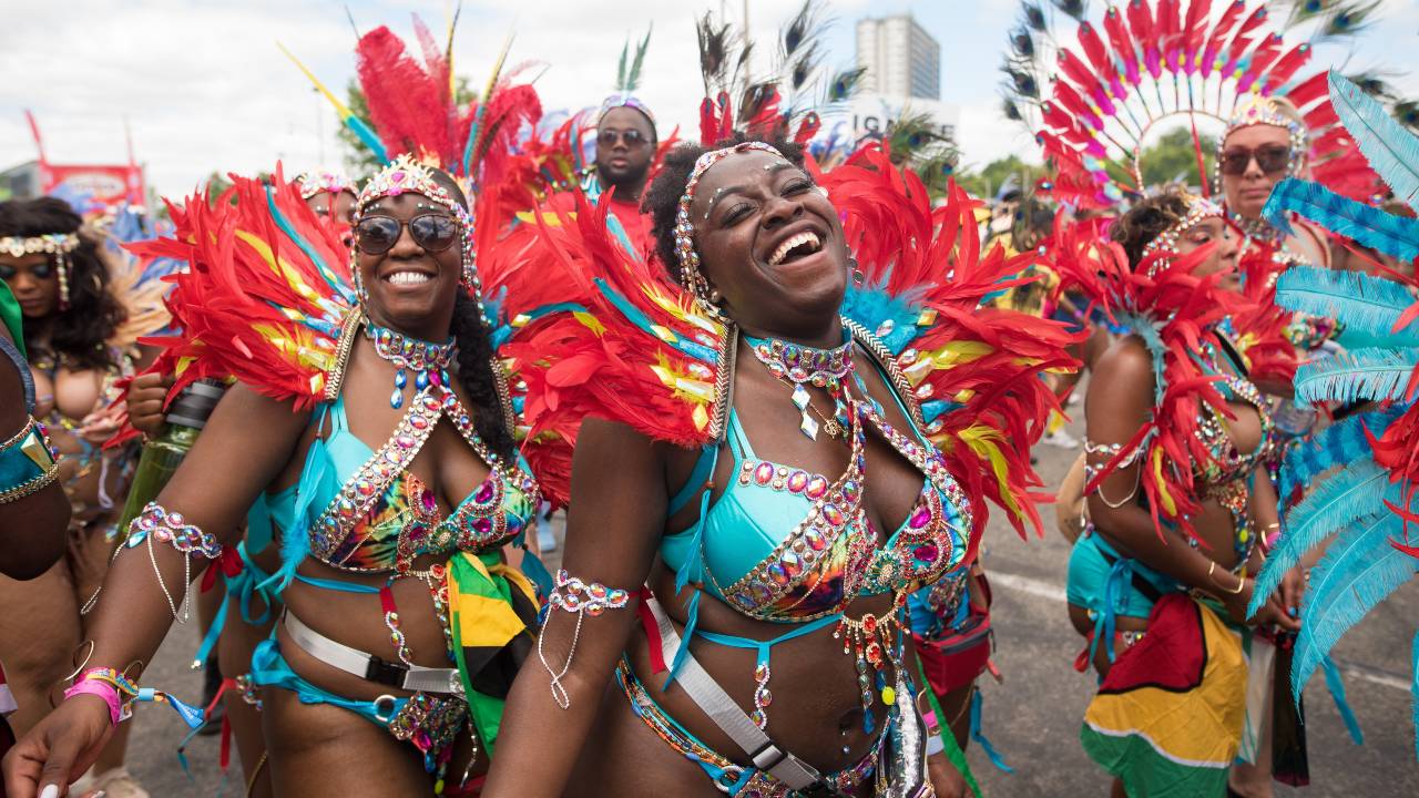 Participants perform during the Grand Parade at the 2022 Toronto Caribbean Carnival