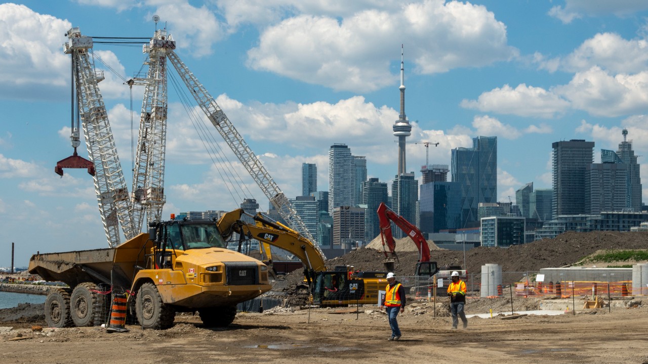 Construction crews work on the Port Lands renewal project in Toronto